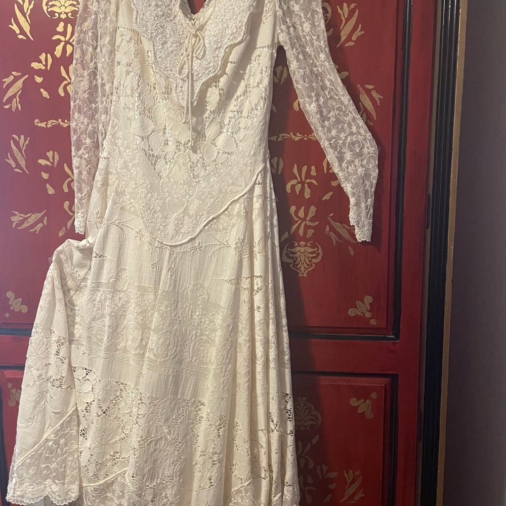 Custom long gown by Martin MccreA worn onetime size Large all tea stained lace.